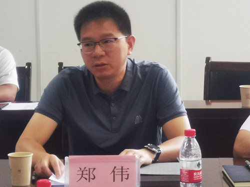 40c028b0fe554bacb8aa73fc7209d236.jpg 郑伟.jpg